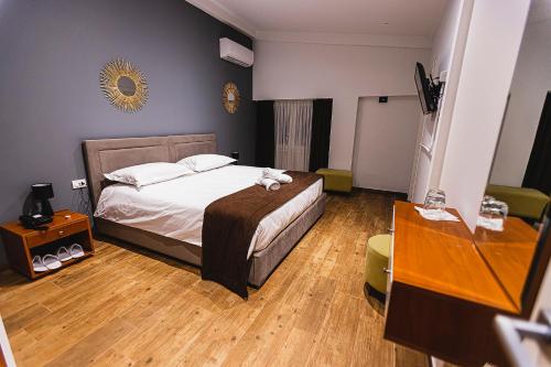Imagen de la habitación del Hotel Olivar Tirana. Foto 12
