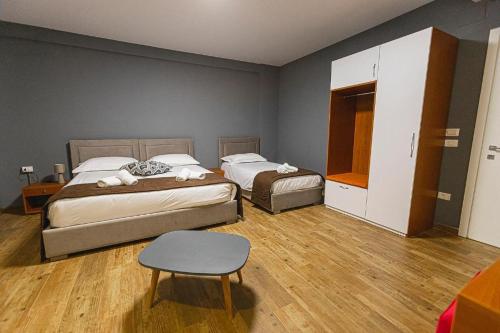 Imagen de la habitación del Hotel Olivar Tirana. Foto 18