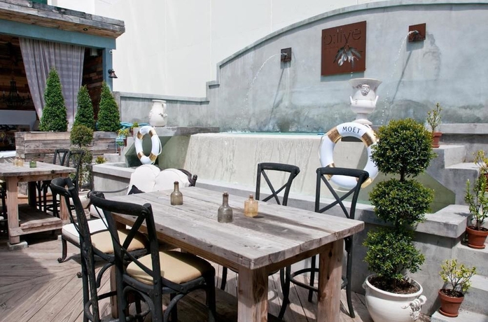 Imagen del bar/restaurante del Hotel Olive Boutique , A Small Luxury Of The World. Foto 6