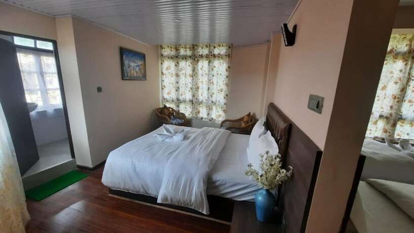 Imagen de la habitación del Hotel Olive Branch Darjeeling. Foto 15