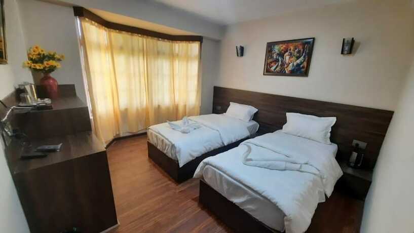 Imagen de la habitación del Hotel Olive Branch Darjeeling. Foto 19
