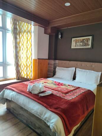 Imagen de la habitación del Hotel Olive Branch Darjeeling. Foto 20