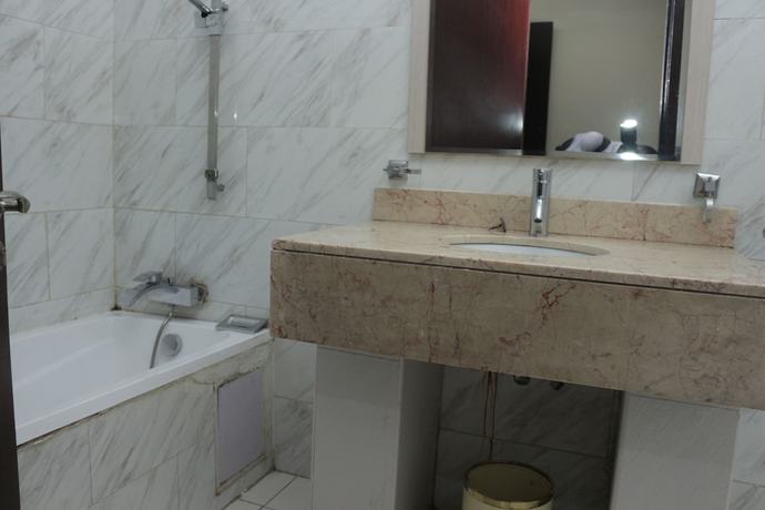 Imagen de la habitación del Hotel Olive Branch. Foto 15