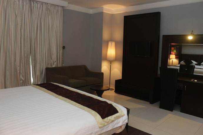 Imagen de la habitación del Hotel Olive Branch. Foto 16