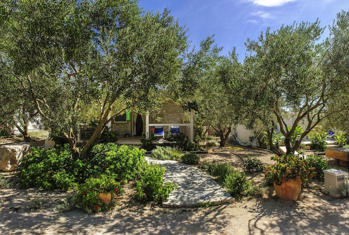 Imagen de la habitación del Hotel Olive Garden Camp Resort. Foto 4