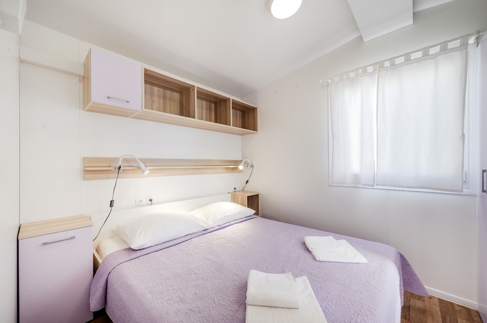 Imagen de la habitación del Hotel Olive Garden Camp Resort. Foto 5
