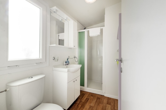 Imagen de la habitación del Hotel Olive Garden Camp Resort. Foto 9