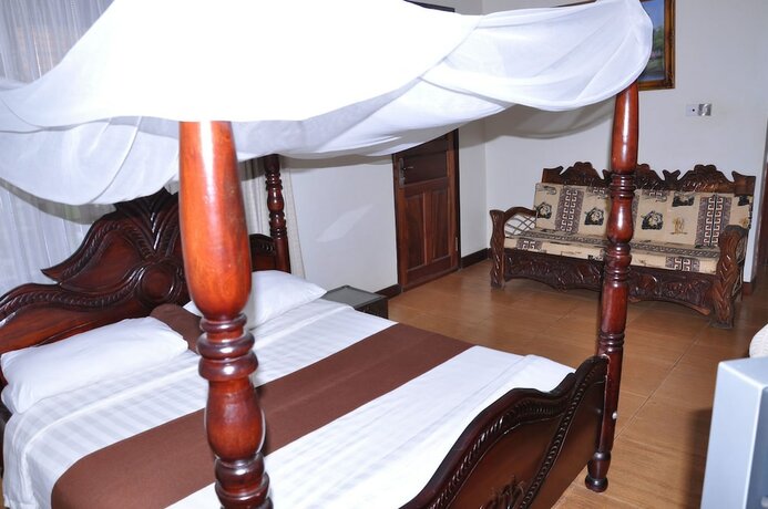 Imagen de la habitación del Hotel Olive Gardens. Foto 16