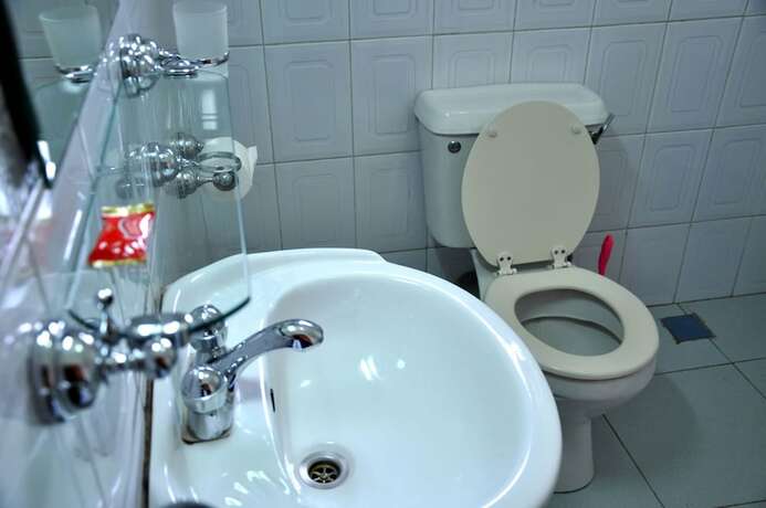 Imagen de la habitación del Hotel Olive Gardens. Foto 17