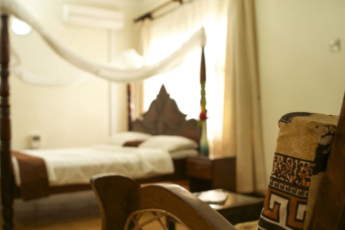 Imagen de la habitación del Hotel Olive Gardens. Foto 19