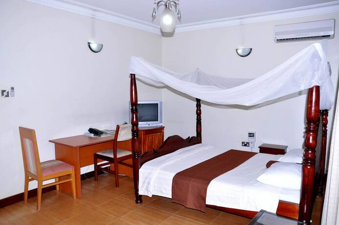 Imagen de la habitación del Hotel Olive Gardens. Foto 20