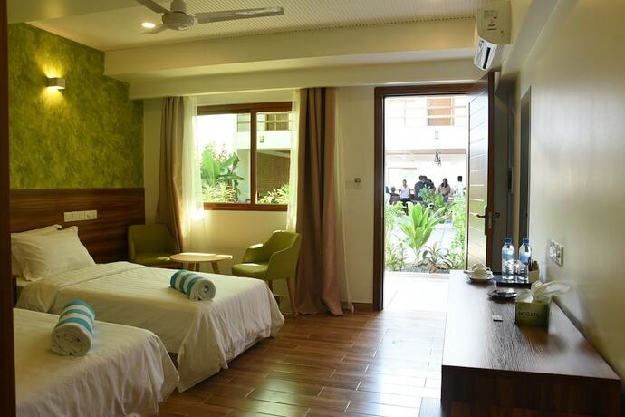Imagen de la habitación del Hotel Olive Goidhoo. Foto 21