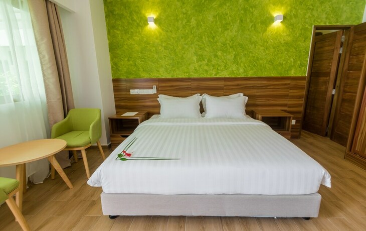 Imagen de la habitación del Hotel Olive Goidhoo. Foto 22