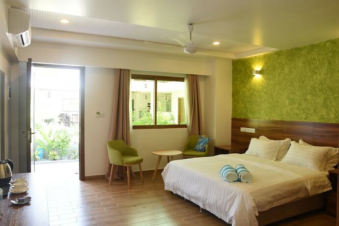 Imagen de la habitación del Hotel Olive Goidhoo. Foto 25