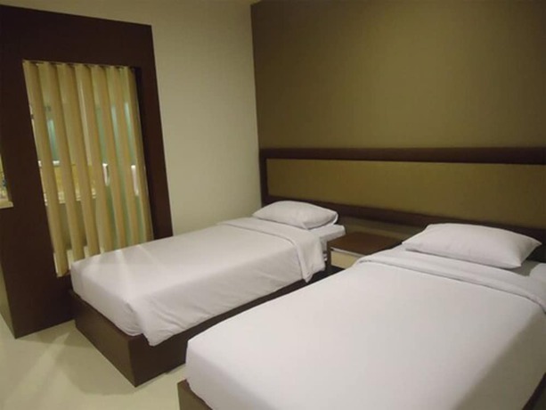 Imagen de la habitación del Hotel Olive, Tangerang. Foto 2