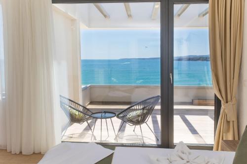 Imagen de la habitación del Hotel Olive Villas Beach. Foto 15