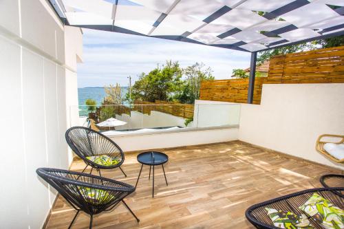 Imagen de la habitación del Hotel Olive Villas Beach. Foto 17
