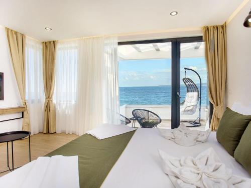 Imagen de la habitación del Hotel Olive Villas Beach. Foto 19