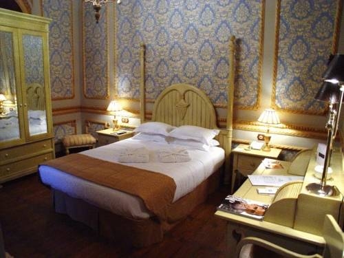 Imagen de la habitación del Hotel Olivenza Palacio. Foto 15