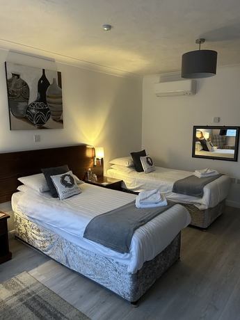 Imagen de la habitación del Hotel Oliver Twist Country Inn. Foto 9
