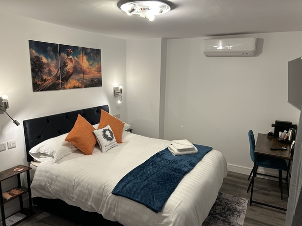 Imagen de la habitación del Hotel Oliver Twist Country Inn. Foto 13