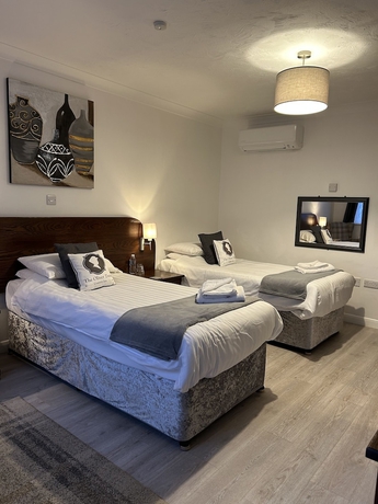 Imagen de la habitación del Hotel Oliver Twist Country Inn. Foto 15