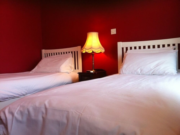 Imagen de la habitación del Hotel Olivers Lodge. Foto 6