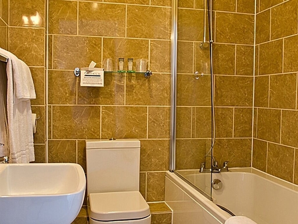 Imagen de la habitación del Hotel Olivers Lodge. Foto 7