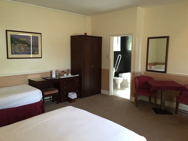 Imagen de la habitación del Hotel Olivers Lodge. Foto 9