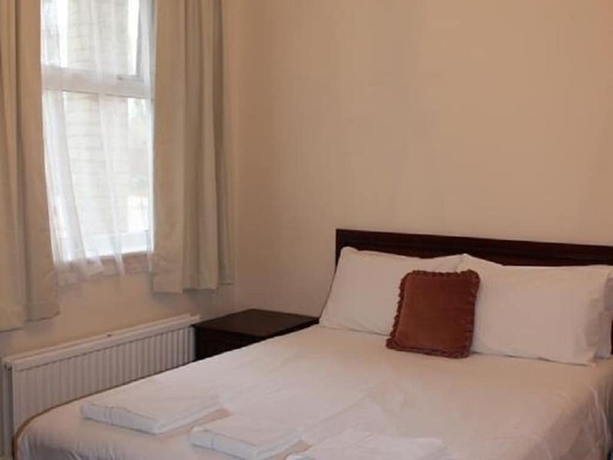 Imagen de la habitación del Hotel Olivers Lodge. Foto 10