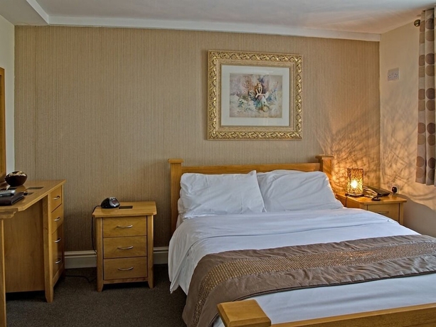 Imagen de la habitación del Hotel Olivers Lodge. Foto 14