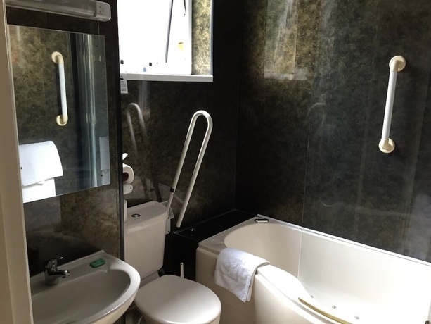 Imagen de la habitación del Hotel Olivers Lodge. Foto 18