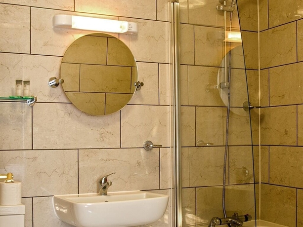 Imagen de la habitación del Hotel Olivers Lodge. Foto 19