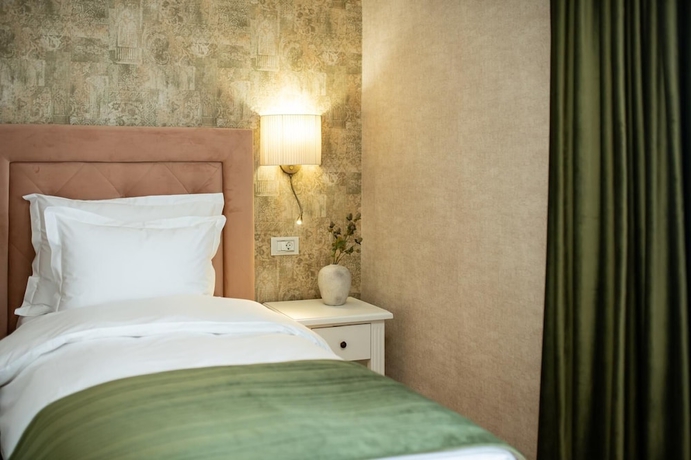 Imagen de la habitación del Hotel Olivia 9teen Boutique. Foto 9