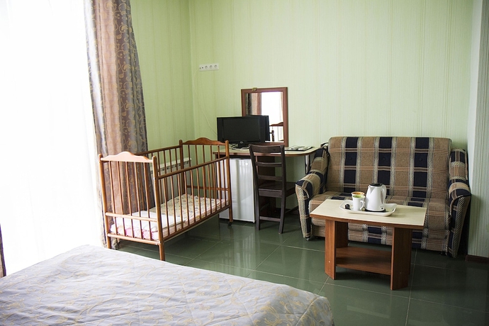 Imagen de la habitación del Hotel Olivia Anapa. Foto 8