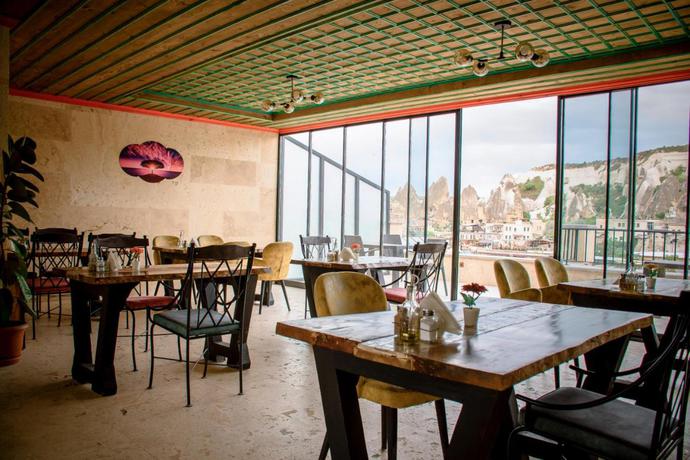 Imagen del bar/restaurante del Hotel Olivia Cave. Foto 2