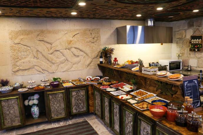 Imagen del bar/restaurante del Hotel Olivia Cave. Foto 3