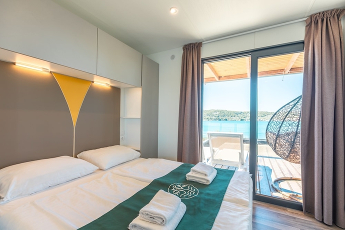 Imagen de la habitación del Hotel Olivia Green Camping. Foto 4