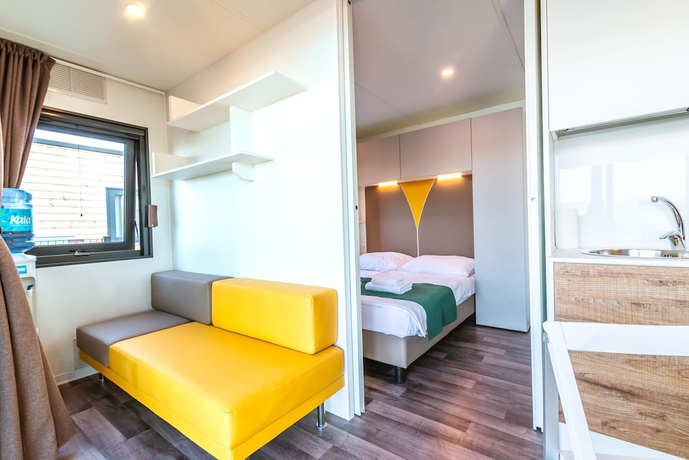 Imagen de la habitación del Hotel Olivia Green Camping. Foto 9