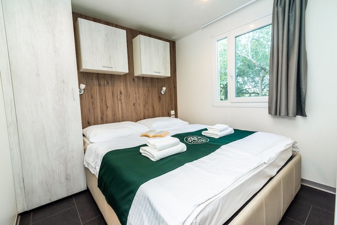 Imagen de la habitación del Hotel Olivia Green Camping. Foto 15
