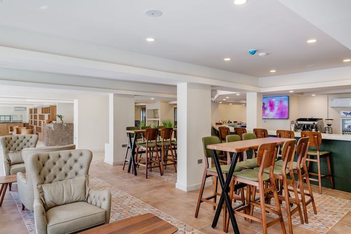 Imagen del bar/restaurante del Hotel Olivia Palm. Foto 2