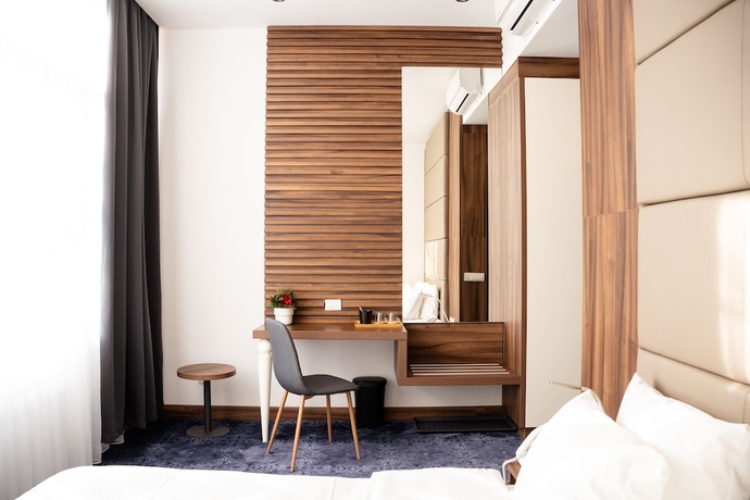 Imagen de la habitación del Hotel Olivia Rooms. Foto 2