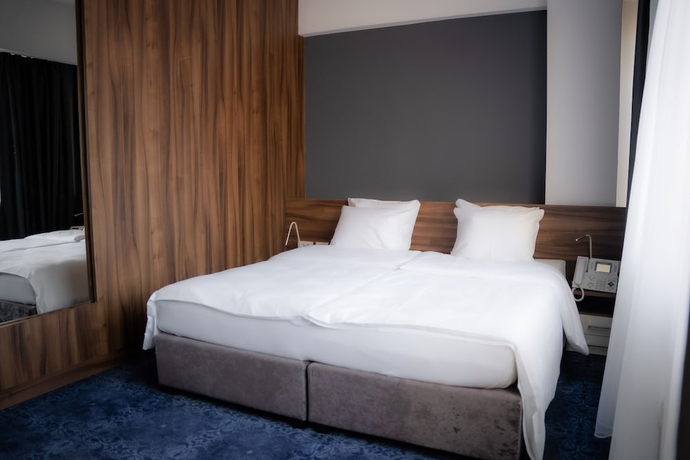 Imagen de la habitación del Hotel Olivia Rooms. Foto 9