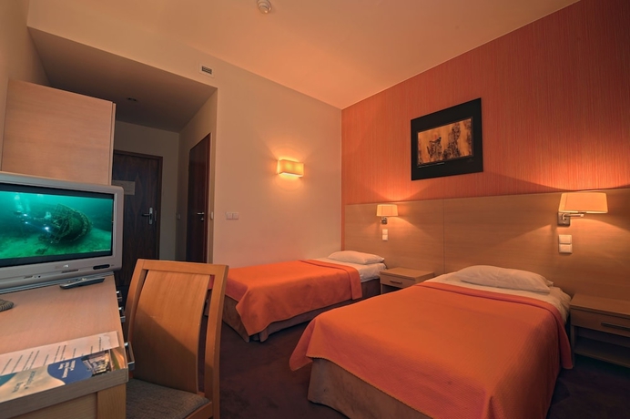 Imagen de la habitación del Hotel Oliwski. Foto 10