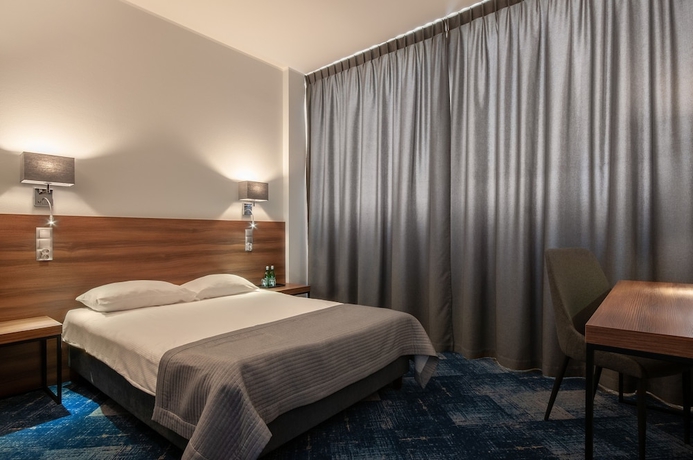 Imagen de la habitación del Hotel Oliwski. Foto 14