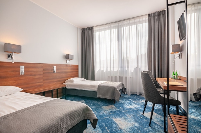 Imagen de la habitación del Hotel Oliwski. Foto 15