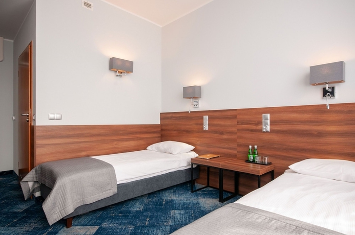 Imagen de la habitación del Hotel Oliwski. Foto 16