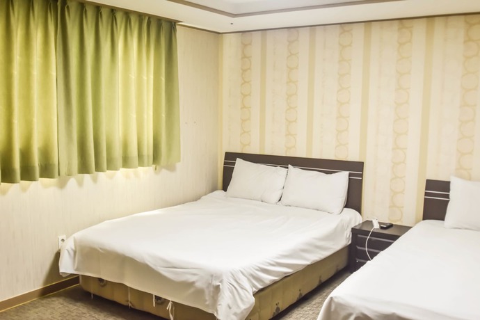 Imagen de la habitación del Hotel Olle Tourist. Foto 17