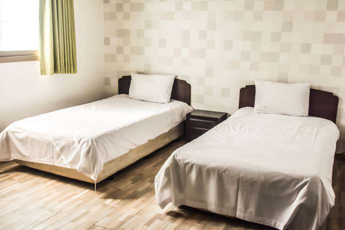 Imagen de la habitación del Hotel Olle Tourist. Foto 18