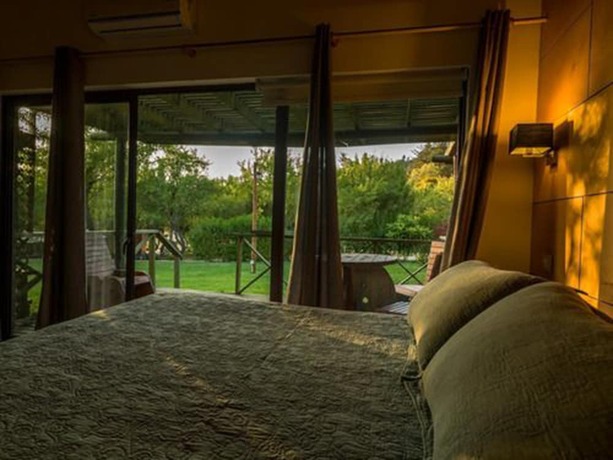 Imagen de la habitación del Hotel Olmu&eacute; Natura Lodge and Spa. Foto 13